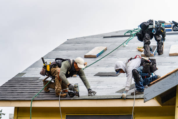 Professional Roofing technician working in Montara, CA